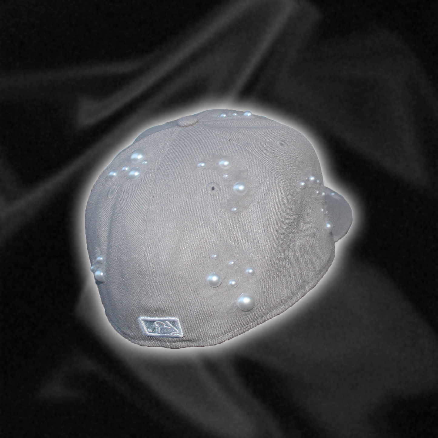 grey cap with pearls